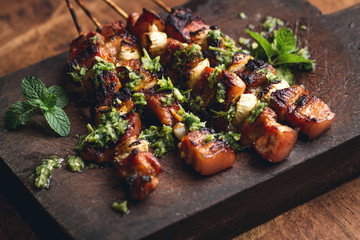 Roasted pork onion skewer barbecue on Chopping board 