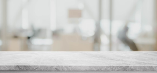 Empty white marble stone tabletop and blurred bokeh office interior space banner background - can...