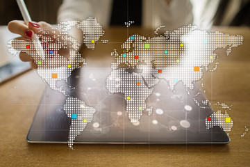 Worlds maps on virtual screen. Business, internet and technology concept.