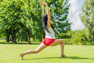 Concept of sport woman. Girl training outdoor, fit lifestyle. Modern life of young lady 