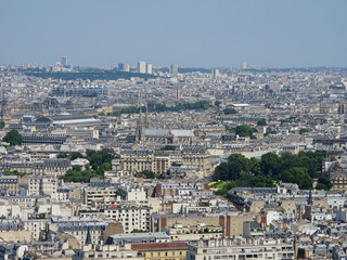 Fototapeta na wymiar Elevated View of Paris, France Rooftops During a Summer Day
