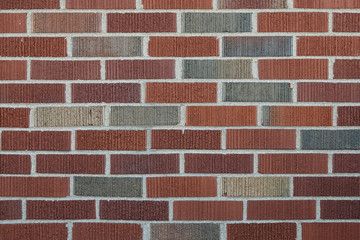 Obraz premium Solid and Multicolored Brick Wall