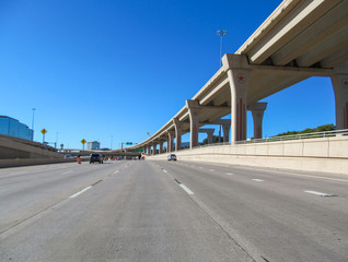 Highway road and bridges in Dallas suburb, Texas, USA. Beautiful view of modern elevated way...