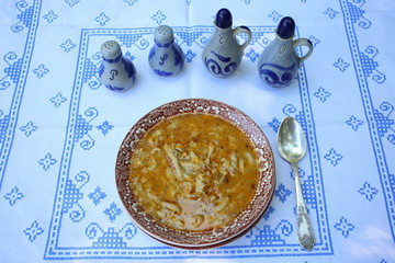 traditional tripe soup on a rustic table