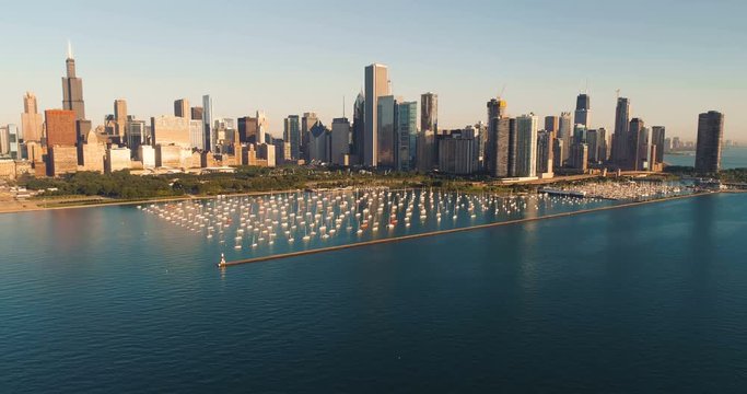 Aerial view above Lake Michigan with Chicago skyline panorama. Boats parked at the marina