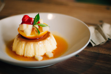 Orange cake on wooden table
