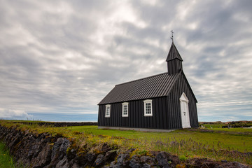 Fototapeta premium Black church of Budir at Snaefellsnes peninsula in Iceland.