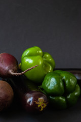 Fresh vegetables on a black background. Food background. Fresh farmer vegetables.
