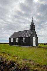Fototapeta na wymiar Black church of Budir at Snaefellsnes peninsula in Iceland.