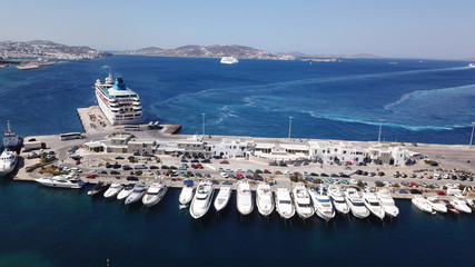 Aerial drone bird's eye view photo of busy new port of Mykonos island, Cyclades, Greece