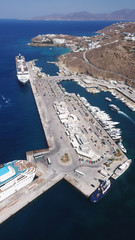 Aerial drone bird's eye view photo of busy new port of Mykonos island, Cyclades, Greece