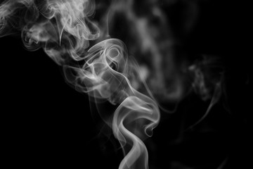 smoke from incense in front of black background