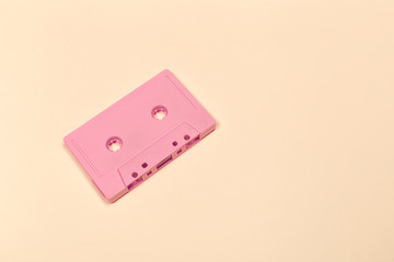 Retro cassette tapes on color background