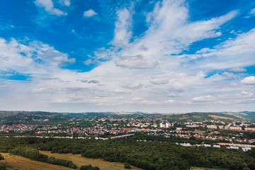 Fototapeta na wymiar Osinniki, RUSSIA - July 17, 2018: Aerial photography of city in Kemerovo region, city near river