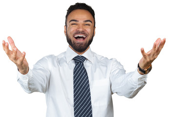 Portrait of a cheerful male celebrating victory while standing on white background