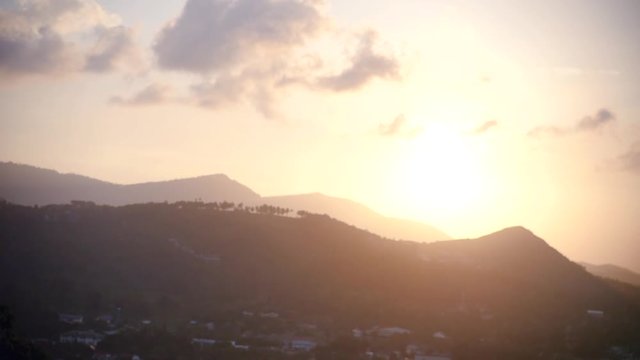Meet the sunset, standing on the mountain and hug your second half. Slow motion, HD, 1920x1080