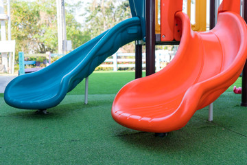 plastic slide on yard in park for the kid's playground