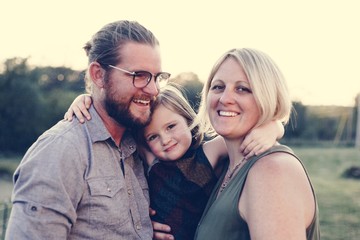 Fototapeta premium A Caucasian family is spending time at the farm together