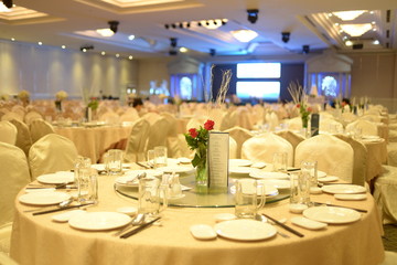 HO CHI MINH CITY, VIET NAM, MARCH, 2018: Original wedding floral decoration in the form of mini-vases and bouquets of flowers put in the table with beautiful mat, green style wedding, a modern wedding