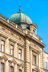 Fototapeta na wymiar beautiful facade of a beige building in europe