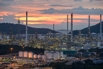 Beautiful sunset  petrochemical oil refinery factory plant cityscape of Chonburi province at night  , landscape Thailand
