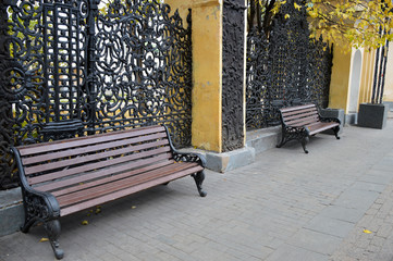 Benches and cast-iron fence