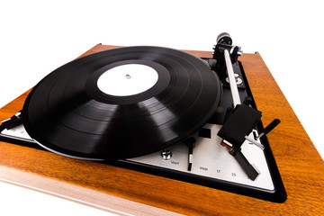 Close up of vintage turntable vinyl record player isolated on white