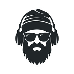 Bearded man in a knitted hat, sunglasses and headphones. DJ Hipster