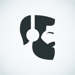 Bearded man wearing headphones.