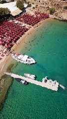 Aerial drone, bird's eye view photo of iconic and famous crowded beach of Super Paradise with...