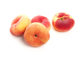 Fototapeta na wymiar Tasty organic doughnut peaches on white