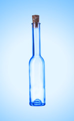 a small empty bottle with a stopper