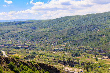Fototapeta na wymiar View of the village in the valley in Caucasus mountains, Georgia