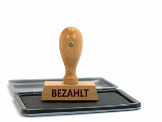 Stempel mit Aufdruck Bezahlt