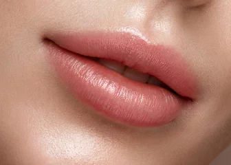 Fotobehang Natural lips close up. Photo shot in the studio © Kobrinphoto