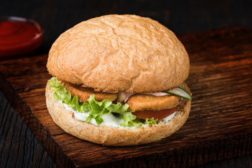 Burger on a wooden board