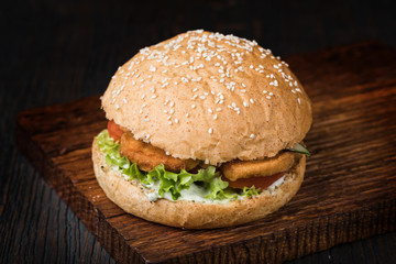 Burger on a wooden board