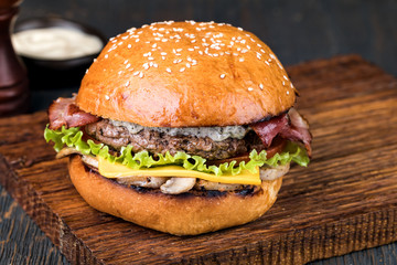 Burger on a wooden board