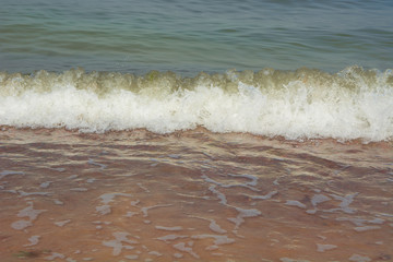 Sea soft  wave on the white sand  beach close up