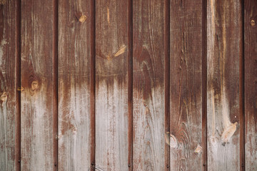 Natural structure of wood surface. Detail fragment of vintage natural wooden texture. Pattern from rural brown wooden wall, fence, floor with copy space. Background of uneven vertical planked wood.