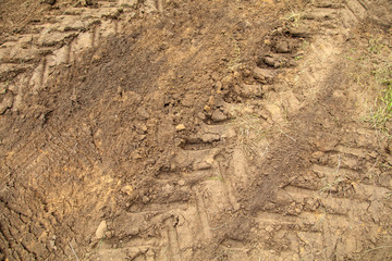 Traces of large wheels on the ground
