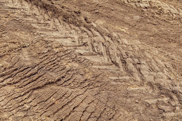 Traces of large wheels on the ground