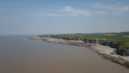 Rocky Jurrasic beach near Kilve Somerset England with many fossils 