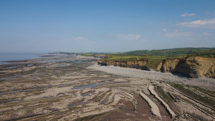 Rocky Jurrasic beach near Kilve Somerset England with many fossils 