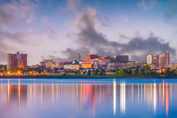 Portland, Maine, USA downtown skyline from Back Cove at twilight.