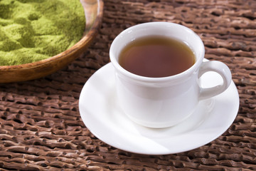 Moringa oleifera tea with powder and leaves - Moringa oleifera