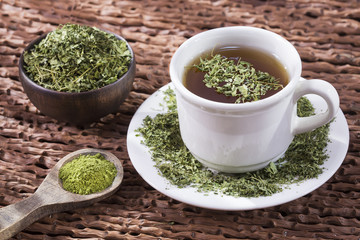 Moringa oleifera tea with powder and leaves - Moringa oleifera
