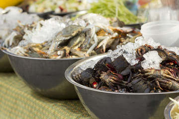 Fresh crab for sale in the fish market at Thailand. seafood on ice. fresh crab seafood product