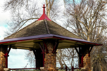 Gazebo roof with winter trees in the background