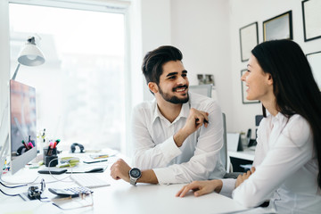 Obraz premium Picture of handsome man and woman as business partners